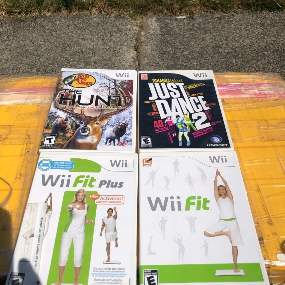 Lots of 4 Nintendo Wii Fit Plus & Wii Fit (White) - Fitness Game Bundles